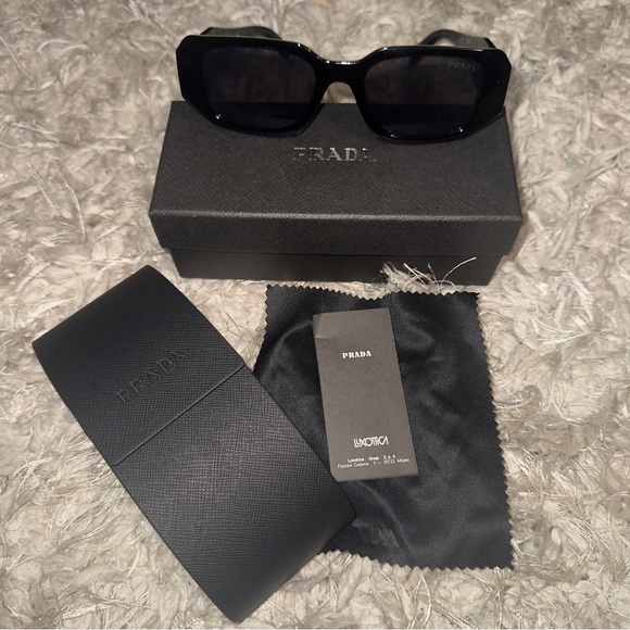 Prada Dark Sunglasses - Picture 1 of 5